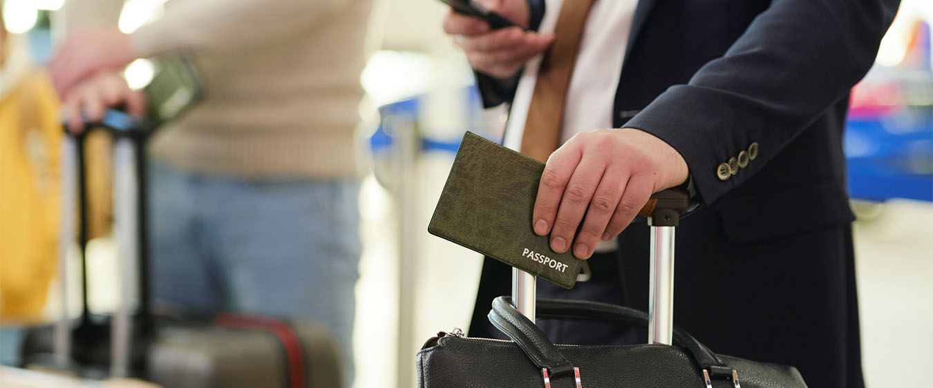 Business man traveling with his passport